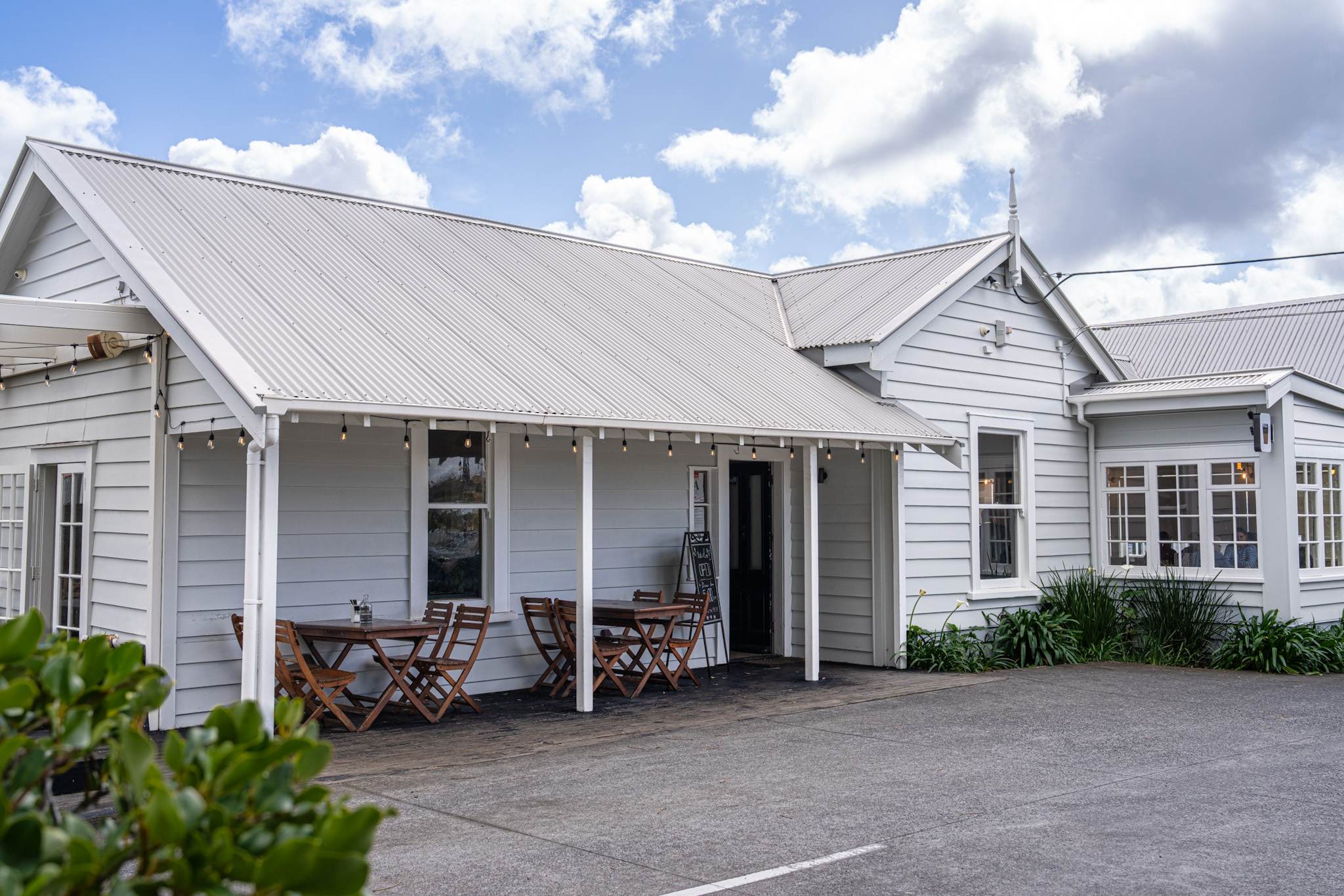 The villa exterior of The Collins Cafe & Bar