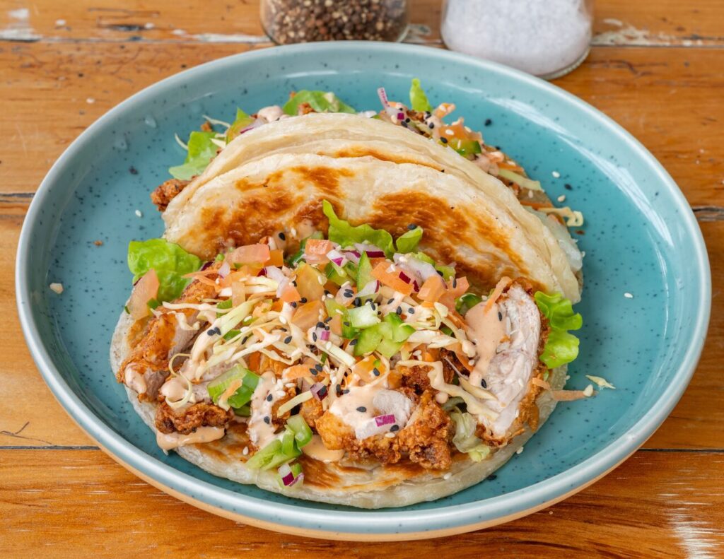 Rotis your way with crispy fried chicken, slaw, salsa and chipotle aioli